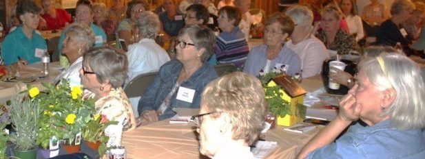 Group of Master Gardeners listening to speaker