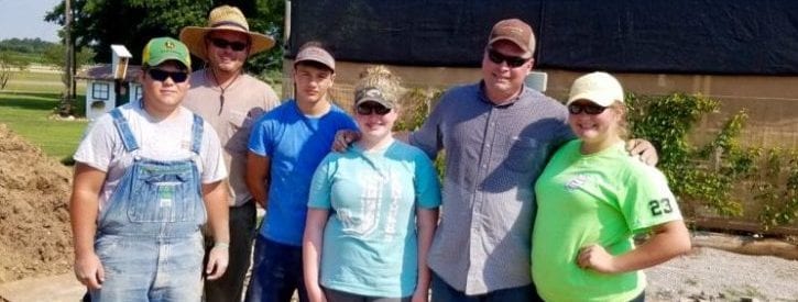 girl scouts preparing keyhole garde to plant and team that helped