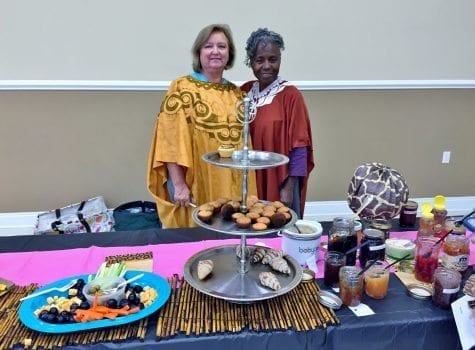 Two of the members showing their African attire