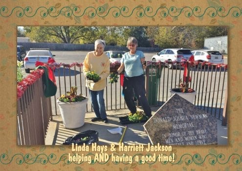 Linda Hays and Harriett Jackson planting pansies
