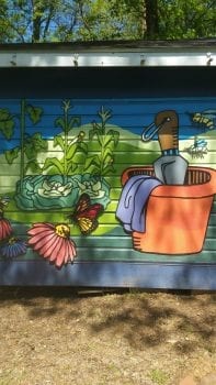 garden shed painted with garden items
